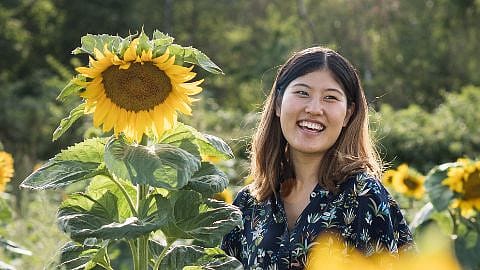 Woman with sunflower